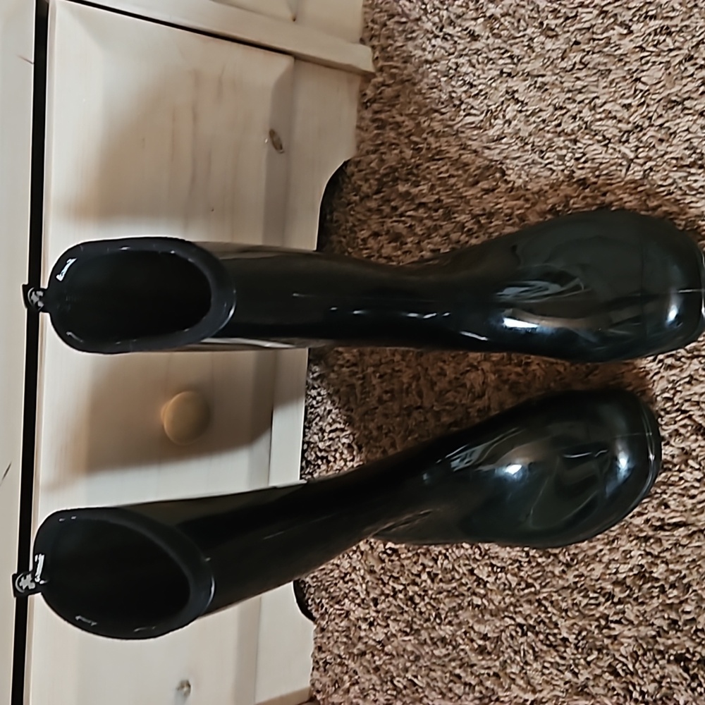 Shiny black rain boots
